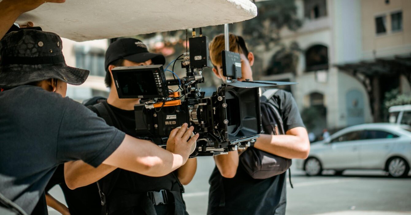 photo-of-man-holding-camera